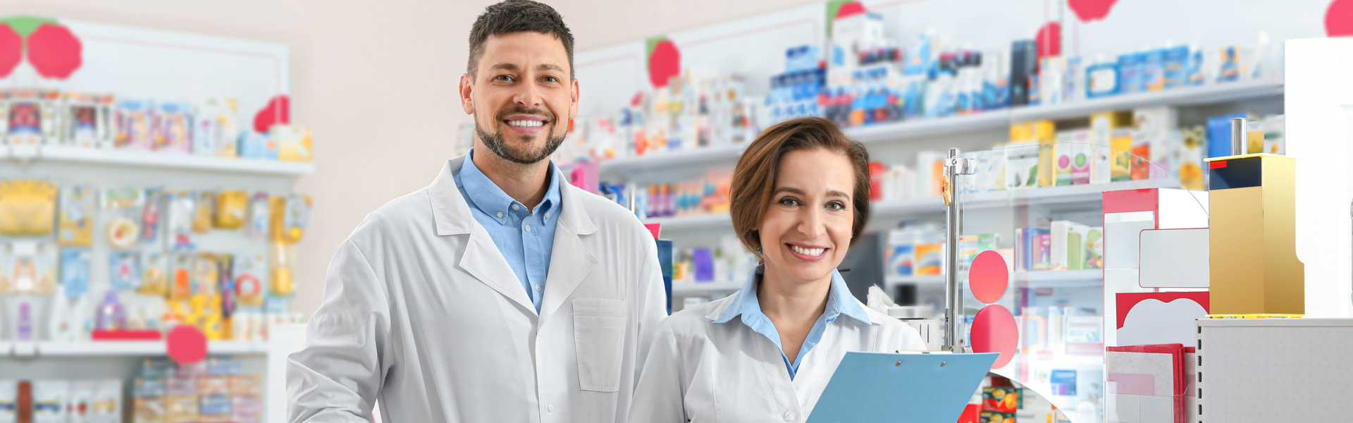 two pharmacists smiling